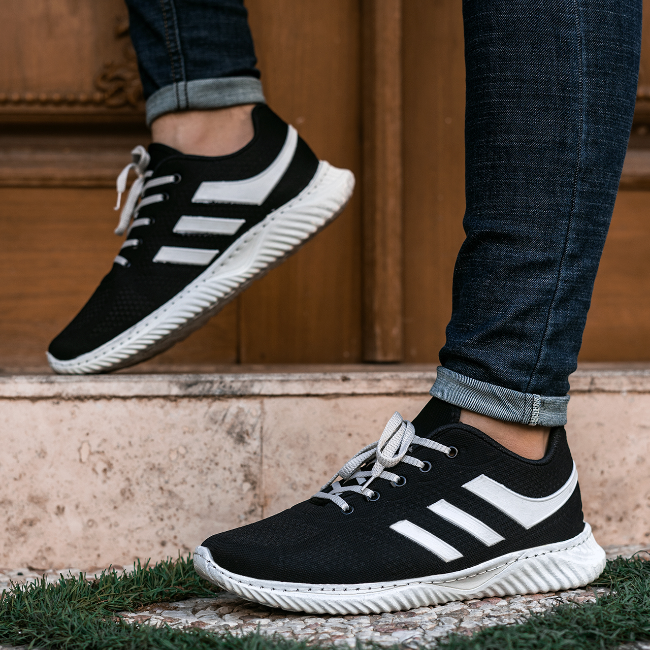 کفش ورزشی آدیداس(T) مشکی زیره سفید مردانه مدل batin