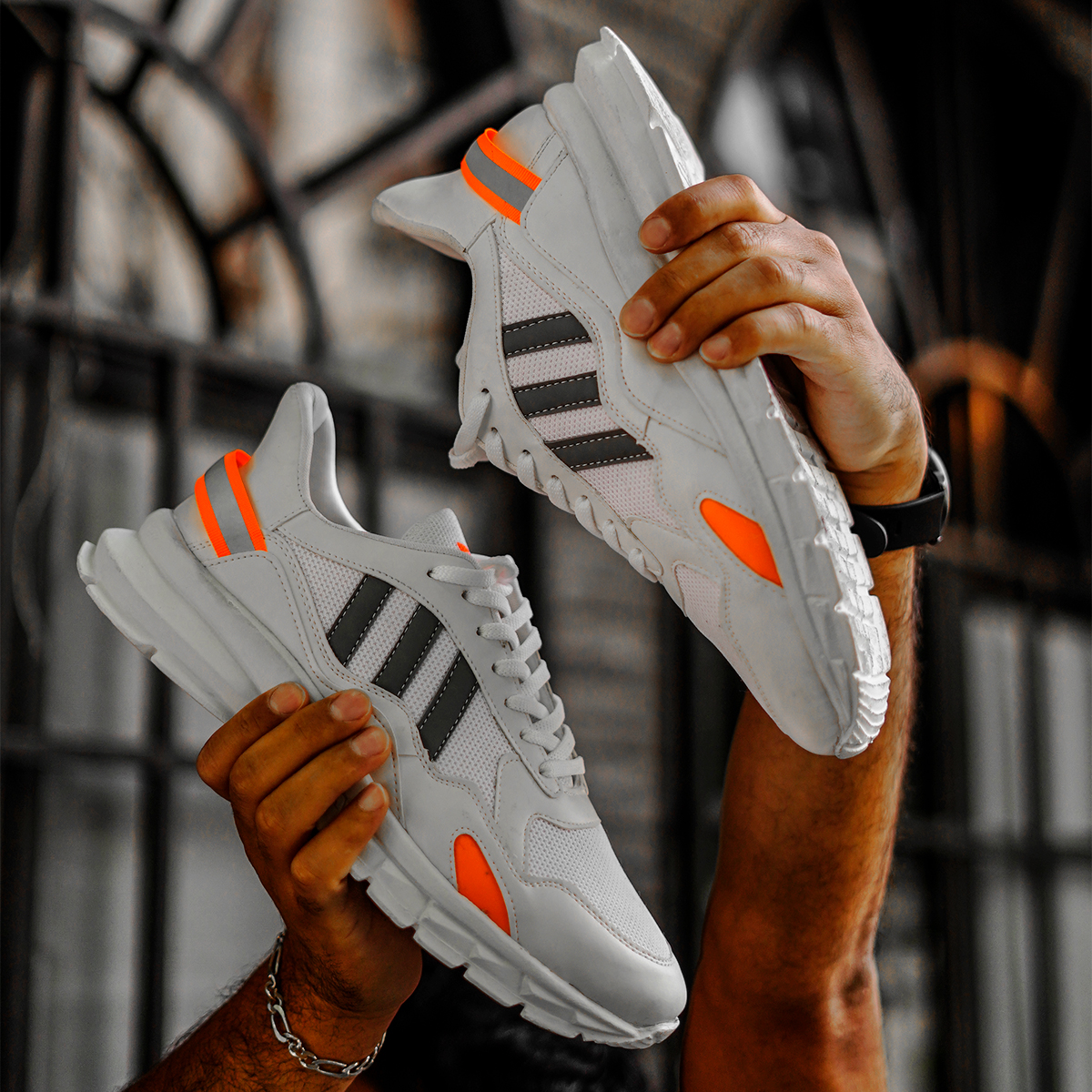 کفش ورزشی Adidas مردانه سفیدنارنجی مدل Levin